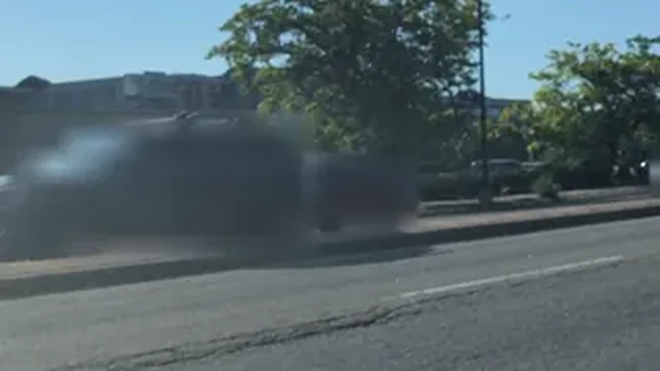 ARTIE capture of an open road with roadside verges and traffic blurred