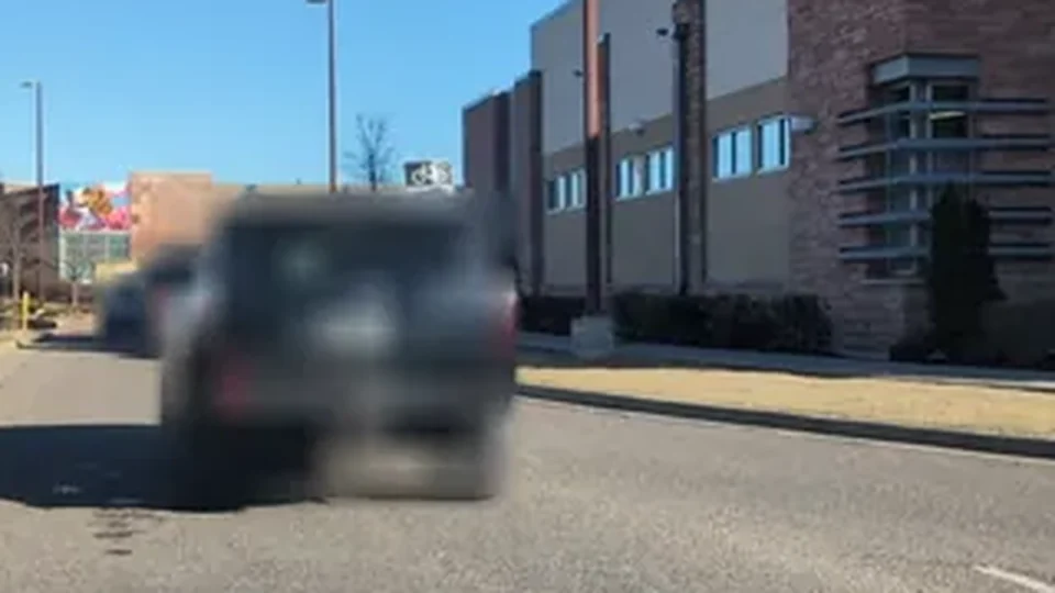 ARTIE capture of a commercial street with passing vehicles blurred by the privacy filter