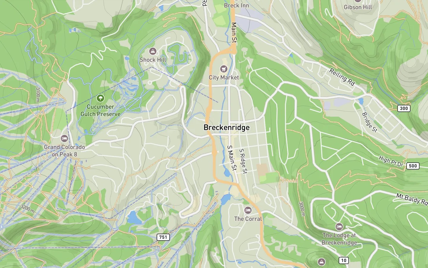 A mountain-town street map with detections scored across its road network